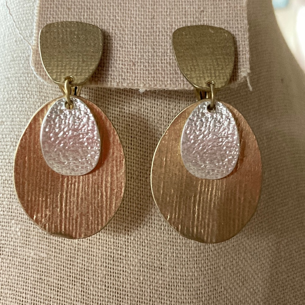 Gold and silver Dillard’s Clip earrings